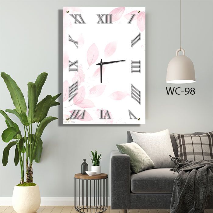 שעון קיר יוקרתי לסלון מעוצב מזכוכית ברקע לבן ורוד