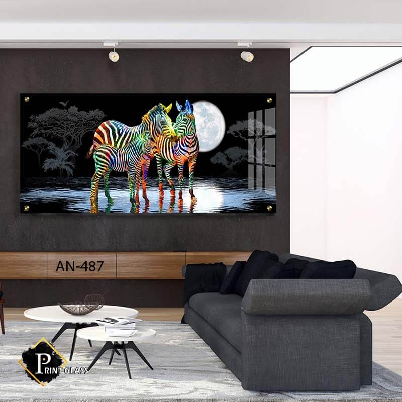 תמונה לסלון או למשרד מזכוכית זברות צבעוניות בחושך