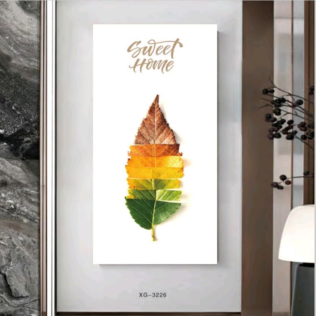 תמונת אווירה של עלה צבעוני - תמונת זכוכית לסלון או לפינת האוכל