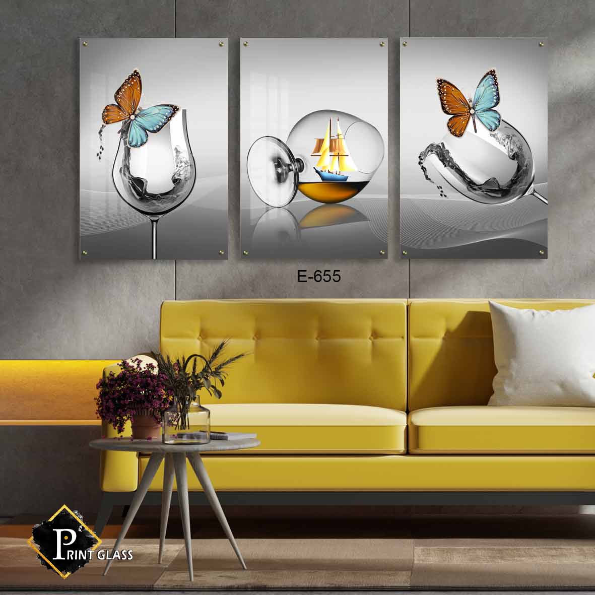 תמונות קיר לסלון בחלקים מזכוכית של כוסות יין ופרפרים