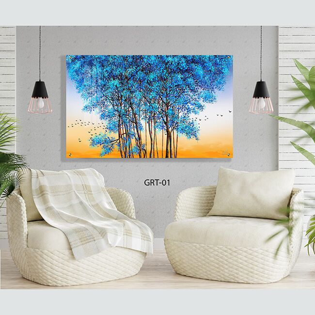 תמונה לסלון של עצים בכחול על רקע שמיים כתומים