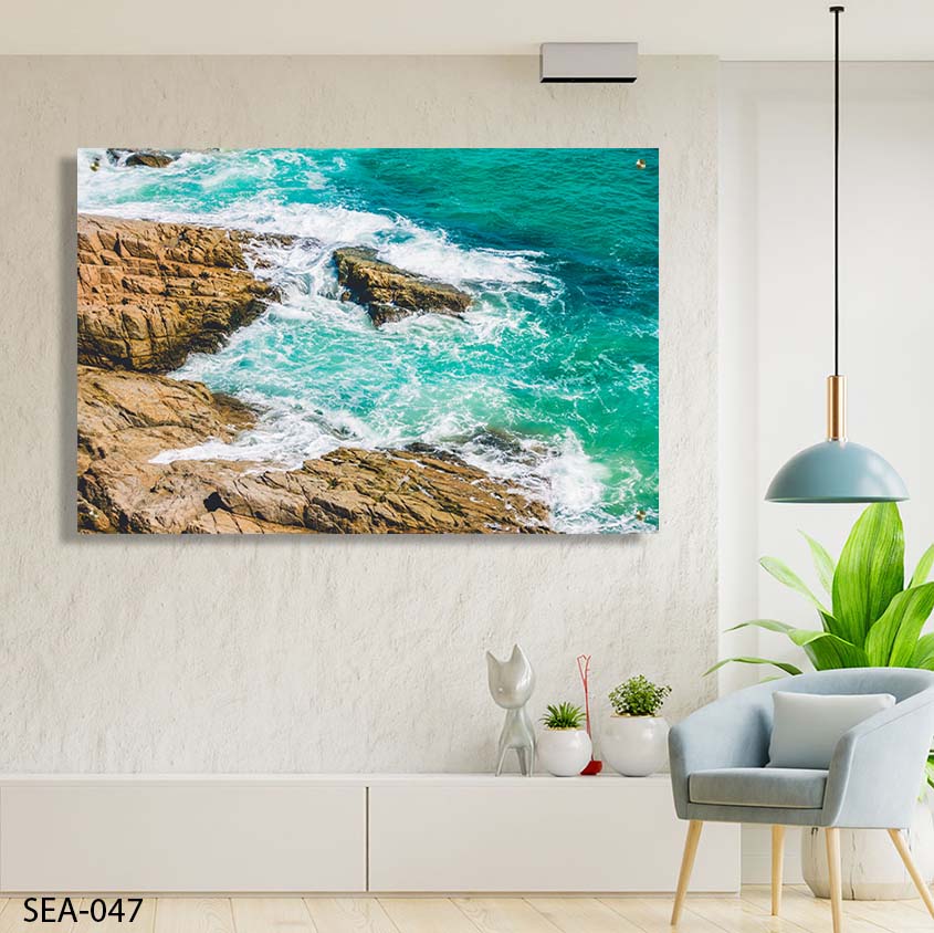 תמונה לסלון של גלי ים טורקיז על סלעי חוף